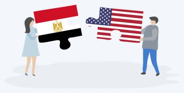 Çift Mısır ve Amerikan bayrakları ile iki bulmaca parçaları tutan. Mısır ve Amerika Birleşik Devletleri ulusal semboller i.