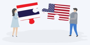 Çift Tay ve Amerikan bayrakları ile iki bulmaca parçaları tutan. Tayland ve Amerika Birleşik Devletleri ulusal semboller birlikte.