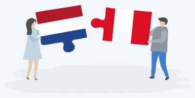 Hollanda ve Perulu bayrakları ile iki bulmaca parçaları tutan çift. Hollanda ve Peru ulusal sembolleri birlikte.