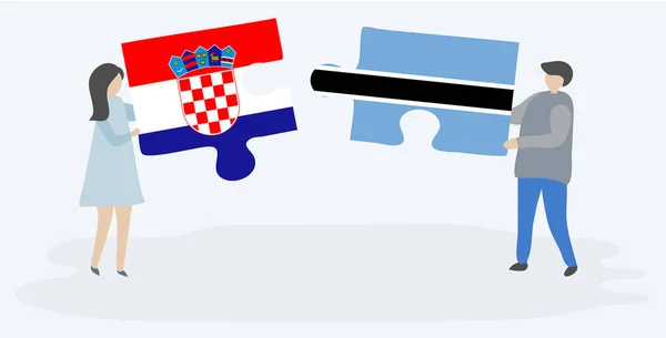 Ζευγάρι Που Κρατά Δύο Κομμάτια Παζλ Σημαίες Κροατών Και Motswana — Διανυσματικό Αρχείο
