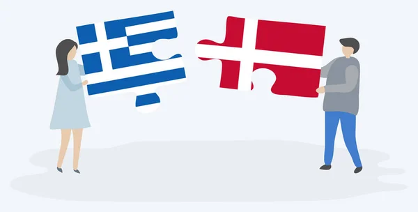 Casal Segurando Duas Peças Quebra Cabeças Com Bandeiras Gregas Dinamarquesas — Vetor de Stock