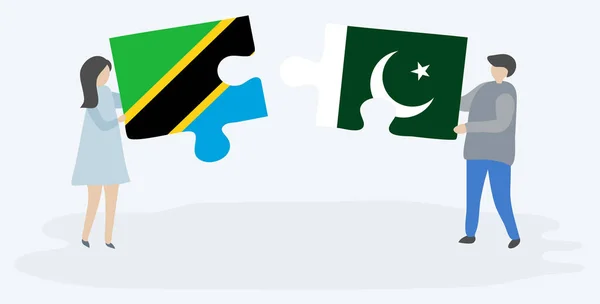 Tanzanya Pakistan Bayrakları Ile Iki Bulmaca Parçaları Tutan Çift Tanzanya — Stok Vektör