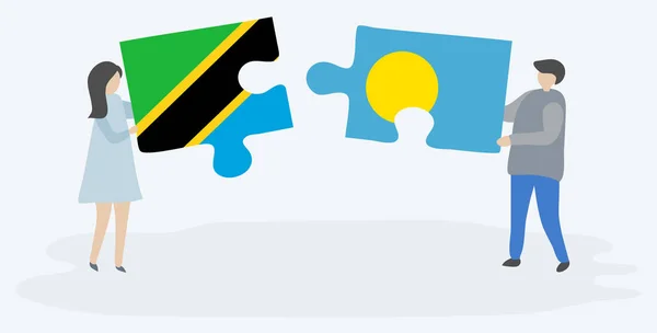 Paar Houden Twee Puzzels Stukken Met Tanzaniaanse Palauan Vlaggen Tanzania — Stockvector