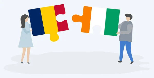 一对夫妇拿着两块拼图 上面挂着乍得和科特迪瓦国旗 乍得和象牙海岸国家符号在一起 — 图库矢量图片