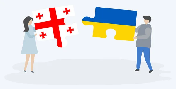 Couple Holding Two Puzzles Pieces Georgian Ukrainian Flags Georgia Ukraine — Stock Vector