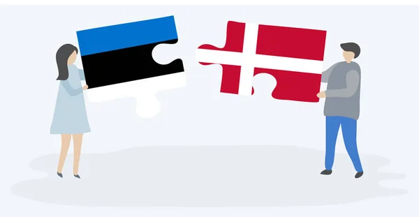 Casal Segurando Duas Peças Quebra Cabeças Com Bandeiras Estonianas Dinamarquesas —  Vetores de Stock