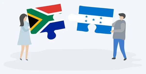 南アフリカとホンジュラスの旗を持つ2つのパズルのピースを保持しているカップル 南アフリカとホンジュラスの国のシンボル — ストックベクタ