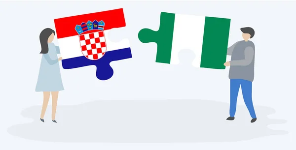 Ζευγάρι Που Κρατά Δύο Κομμάτια Παζλ Κροατικές Και Νιγηριανές Σημαίες — Διανυσματικό Αρχείο