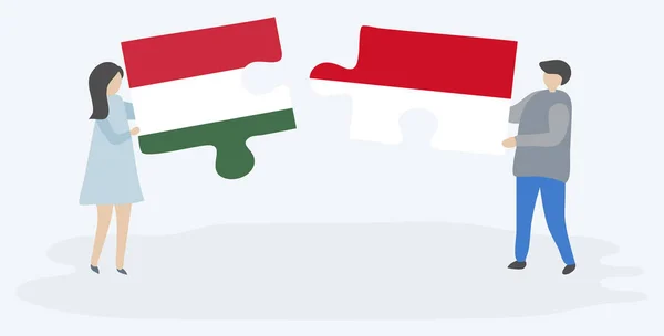Ζευγάρι Που Κρατά Δύο Κομμάτια Παζλ Ουγγρικά Και Ινδονησιακά Σημαίες — Διανυσματικό Αρχείο