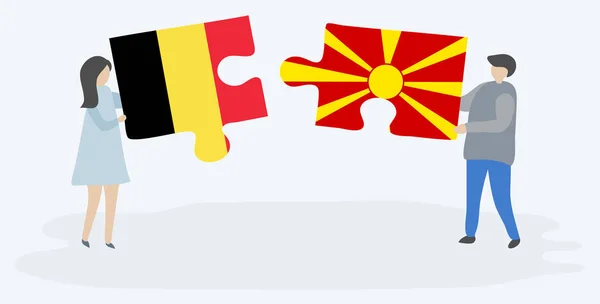 Belçika Makedon Bayraklarıyla Iki Bulmaca Parçası Tutan Çift Belçika Makedonya — Stok Vektör