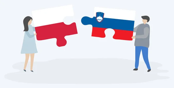 Para Trzyma Dwa Puzzli Polskich Słoweńskich Flag Symbole Narodowe Polski — Wektor stockowy