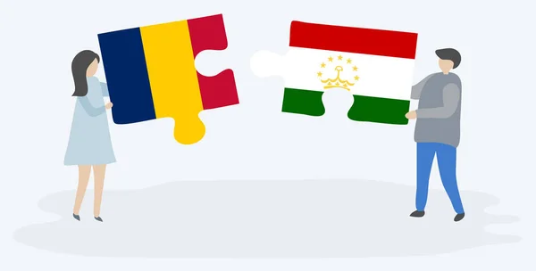 Dvojice Která Drží Dvě Skládanky Vlajkami Chadian Tádžické Čad Tádžické — Stockový vektor