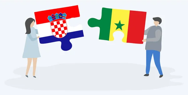 Ζευγάρι Που Κρατά Δύο Κομμάτια Παζλ Σημαίες Κροατίας Και Σενεγάλη — Διανυσματικό Αρχείο