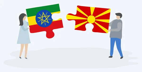 Couple Tenant Deux Pièces Puzzles Avec Des Drapeaux Éthiopiens Macédoniens — Image vectorielle