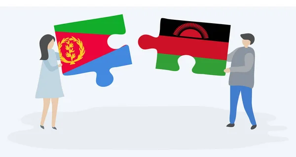 Para Trzyma Dwa Kawałki Puzzli Erytrean Flagi Malawian Erytrea Malawi — Wektor stockowy