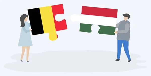 Paar Houden Twee Puzzels Stukken Met Belgische Hongaarse Vlaggen België — Stockvector