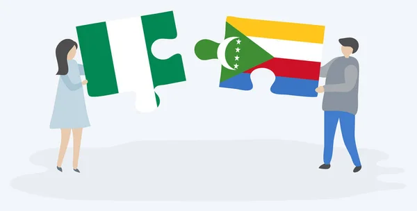Casal Segurando Duas Peças Quebra Cabeças Com Bandeiras Nigerianas Comorianas — Vetor de Stock