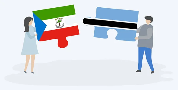 一对夫妇拿着两块拼图 上面挂着赤道几内亚和莫茨瓦纳国旗 赤道几内亚和博茨瓦纳国家符号在一起 — 图库矢量图片
