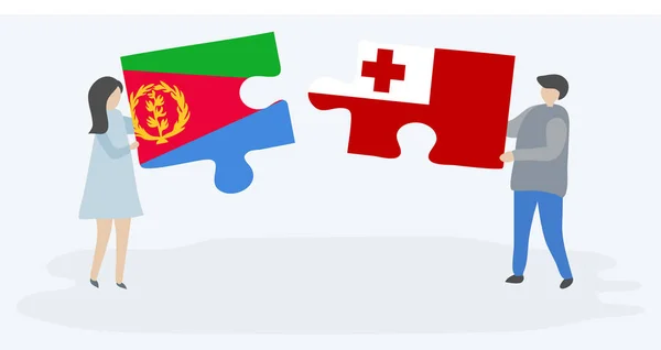 Para Trzyma Dwa Kawałki Puzzli Erytrean Flagi Tongan Erytrea Tonga — Wektor stockowy