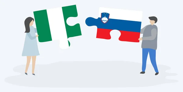 Ζευγάρι Που Κρατά Δύο Κομμάτια Παζλ Νιγηριανές Και Σλοβενικές Σημαίες — Διανυσματικό Αρχείο