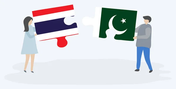 Tay Pakistan Bayrakları Ile Iki Bulmaca Parçaları Tutan Çift Tayland — Stok Vektör
