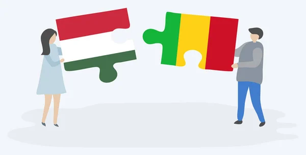 Pareja Sosteniendo Dos Piezas Rompecabezas Con Banderas Húngaras Malienses Hungría — Archivo Imágenes Vectoriales