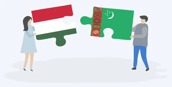 ハンガリーとトルクメンの旗を持つ2つのパズルピースを保持しているカップル ハンガリーとトルクメニスタンの国のシンボル — ストックベクタ