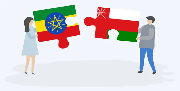 Paar Houden Twee Puzzels Stukken Met Ethiopische Omani Vlaggen Ethiopië — Stockvector
