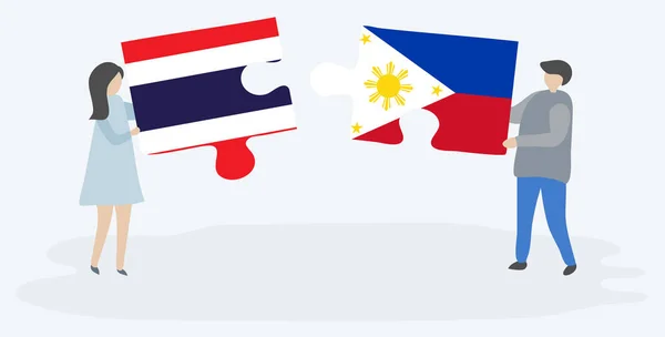 Couple Tenant Deux Pièces Puzzles Avec Des Drapeaux Thaïlandais Philippins — Image vectorielle