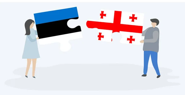 Casal Segurando Duas Peças Quebra Cabeças Com Bandeiras Estonianas Georgianas — Vetor de Stock