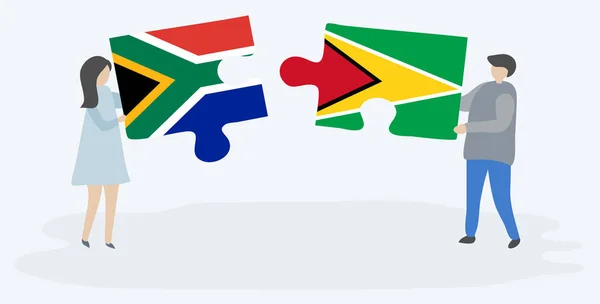 Çift Güney Afrika Guyanese Bayrakları Ile Iki Bulmaca Parçaları Tutan — Stok Vektör