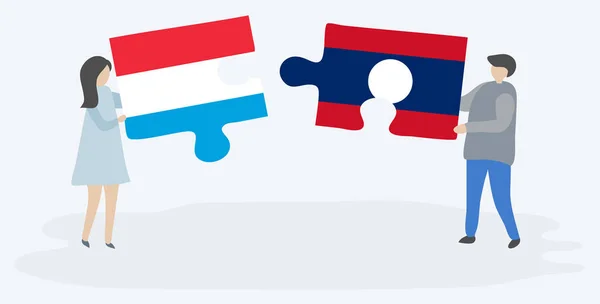 Pareja Sosteniendo Dos Piezas Rompecabezas Con Banderas Luxemburgo Laos Luxemburgo — Archivo Imágenes Vectoriales