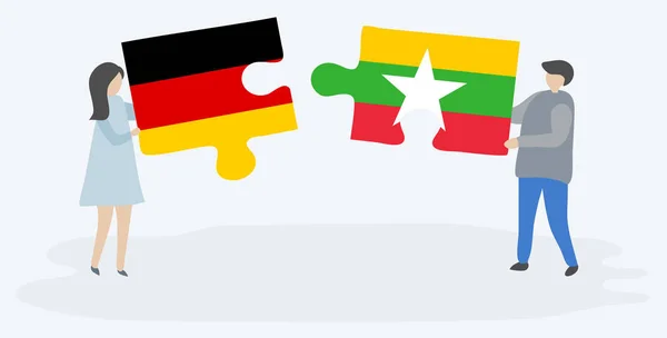 Par Som Innehar Två Pusselbitar Med Tyska Och Burmesiska Flaggor — Stock vektor