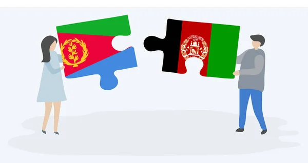 Para Trzyma Dwa Kawałki Puzzli Erytreą Afgańskich Flag Erytrea Afganistan — Wektor stockowy