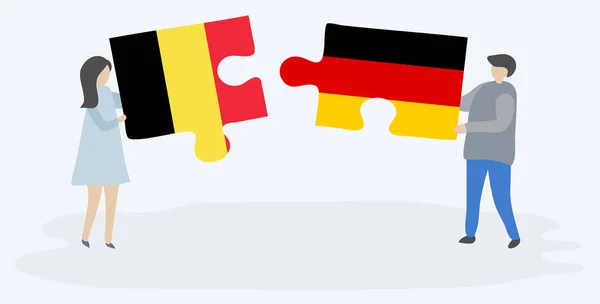 Couple Tenant Deux Pièces Puzzles Avec Des Drapeaux Belges Allemands — Image vectorielle