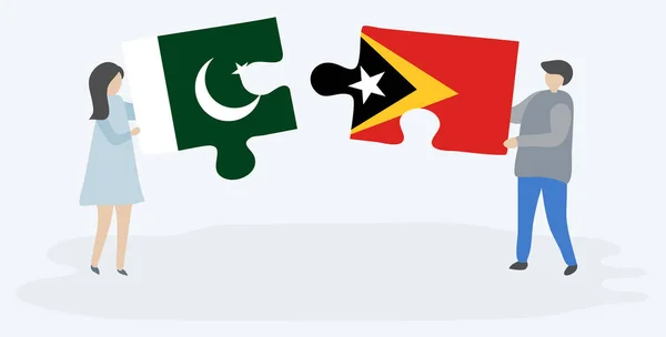 Paar Houden Twee Puzzels Stukken Met Pakistaanse Timorese Vlaggen Pakistan — Stockvector