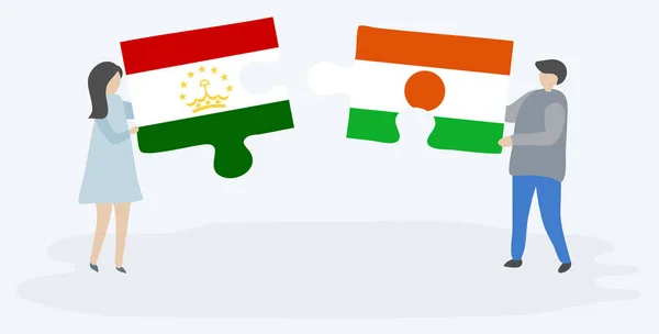 Pasangan Yang Memegang Dua Buah Teka Teki Dengan Bendera Tajikistan - Stok Vektor