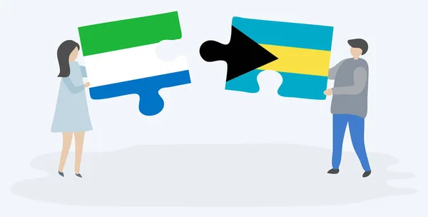 一对夫妇拿着两块拼图 上面挂着塞拉利昂和巴哈马国旗 塞拉利昂和巴哈马国家符号在一起 — 图库矢量图片