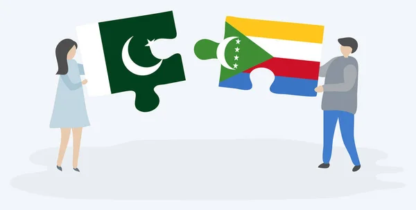 Pakistan Comoran Bayrakları Ile Iki Bulmaca Parçaları Tutan Çift Pakistan — Stok Vektör