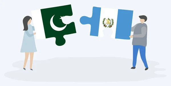 Couple Holding Two Puzzles Pieces Pakistani Guatemalan Flags Pakistan Guatemala — Stock Vector