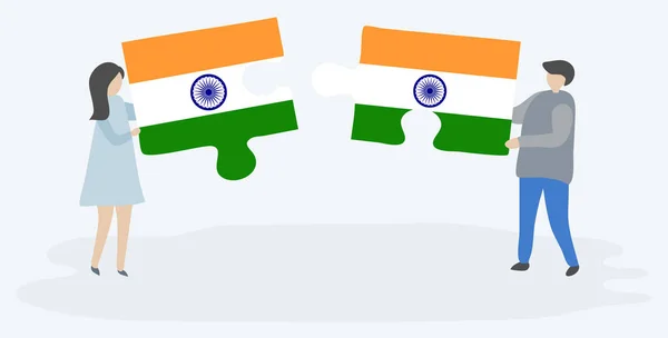 インドとインドの旗を持つ2つのパズルのピースを保持しているカップル インドとインドの国のシンボル — ストックベクタ