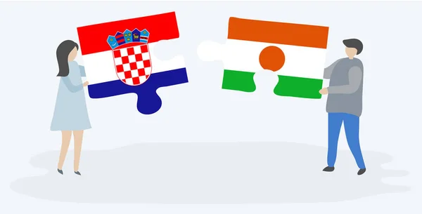 Pareja Sosteniendo Dos Piezas Rompecabezas Con Banderas Croatas Nigerianas Croacia — Archivo Imágenes Vectoriales