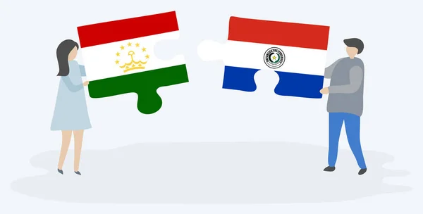 タジキスタンとパラグアイの旗を持つ2つのパズルピースを持つカップル タジキスタンとパラグアイの国のシンボル — ストックベクタ