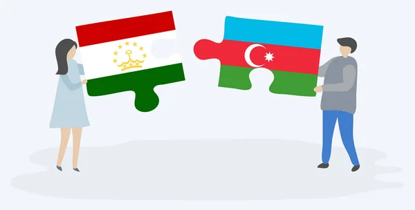 Para Trzyma Dwa Kawałki Puzzle Tadżycki Azerski Flagi Tadżykistan Azerbejdżan — Wektor stockowy