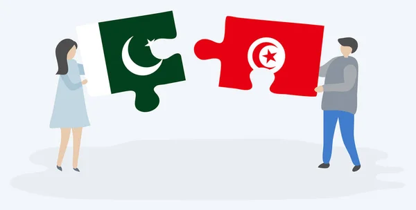 Casal Segurando Duas Peças Quebra Cabeças Com Bandeiras Paquistanesas Tunisinas —  Vetores de Stock