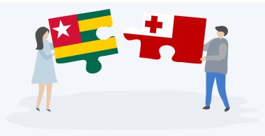 Togolese ve Tongan bayrakları ile iki bulmaca parçaları tutan çift. Togo ve Tonga ulusal sembolleri birlikte.