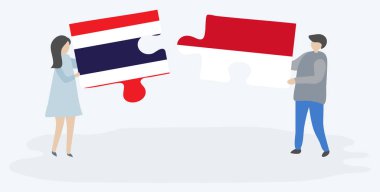 Çift Tay ve Endonezya bayrakları ile iki bulmaca parçaları tutan. Tayland ve Endonezya ulusal sembolleri birlikte.
