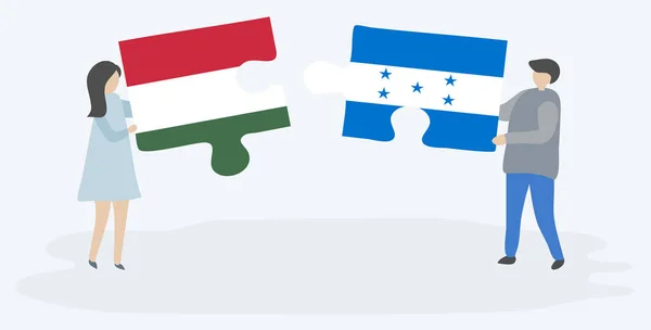 Macar Honduras Bayrakları Ile Iki Bulmaca Parçaları Tutan Çift Macaristan — Stok Vektör