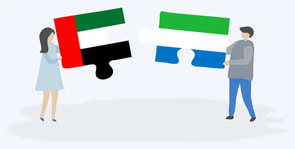 Paar Houden Twee Puzzels Stukken Met Emirian Sierra Leonean Vlaggen — Stockvector