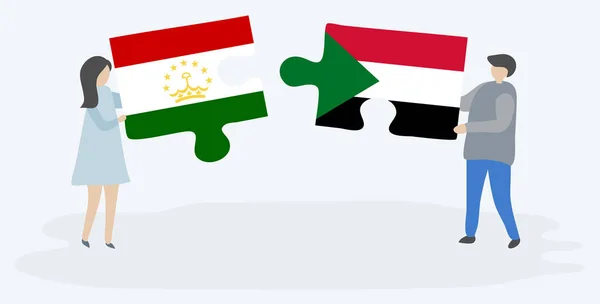 Dvojice Drží Dvě Skládanky Tádžické Súdánskými Vlajkami Národní Symboly Tádžikistánu — Stockový vektor